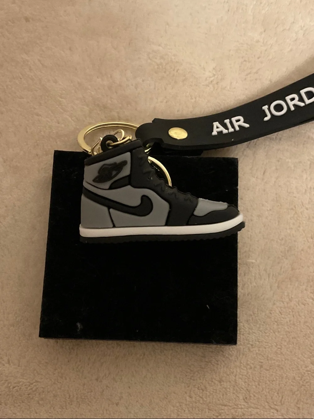 Jordan Black Key Fob with Red Jumpman and Gold Hardware